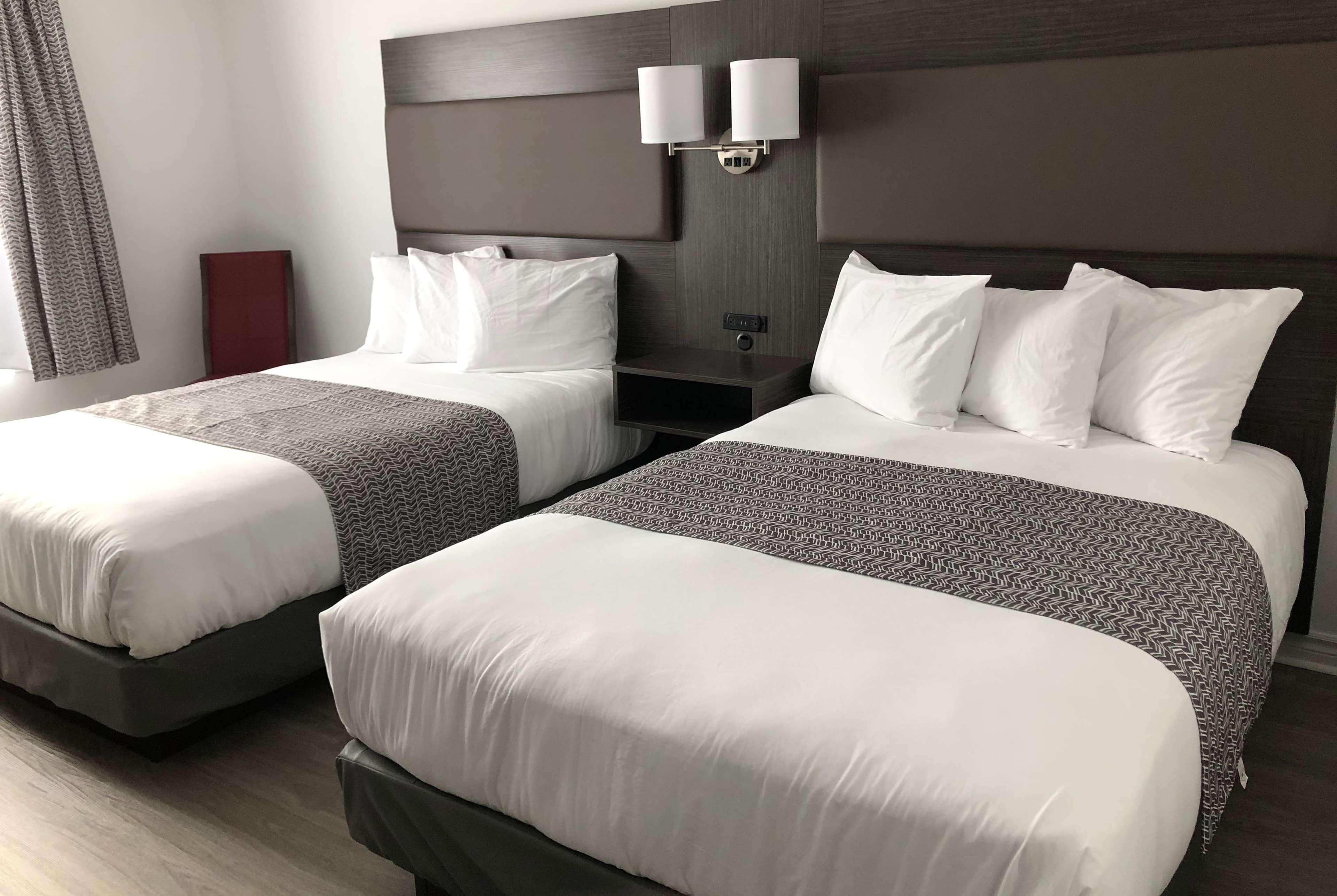 แทรเวลลอดจ์ บาย วินด์แฮม ริโก Hotel Rigaud ภายนอก รูปภาพ